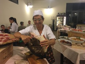 Hand-sliced prosciutto at the cheese feast